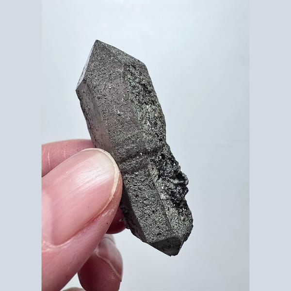 Double-terminated scepter amethyst with hematite from Inner Mongolia — complete view