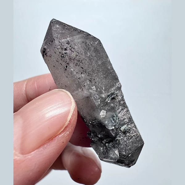 Double-terminated scepter amethyst with hematite from Inner Mongolia — alternate view