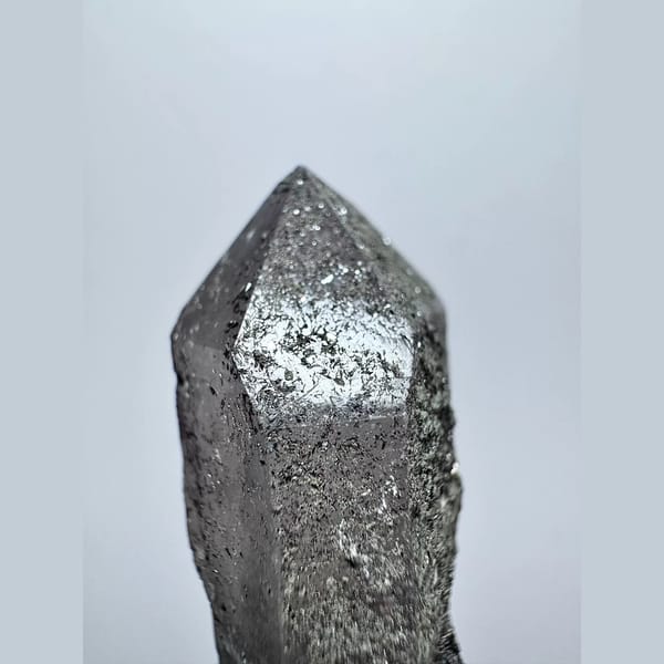Double-terminated scepter amethyst with hematite from Inner Mongolia — detail view