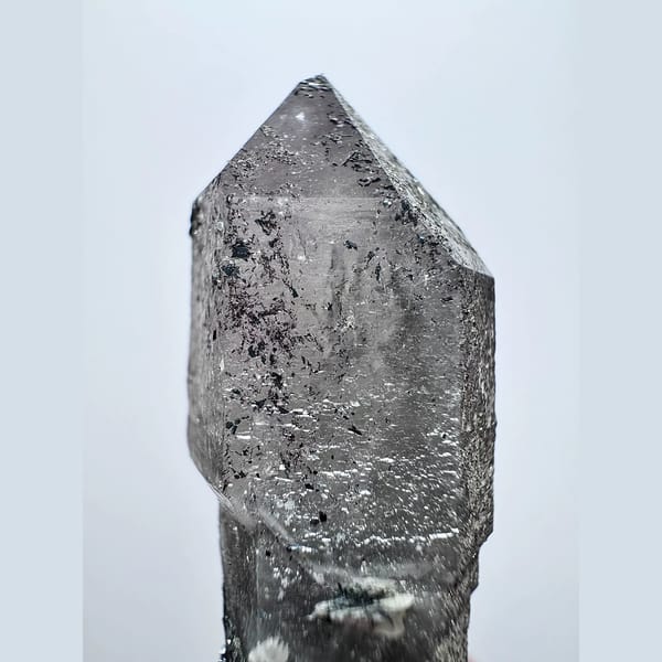 Double-terminated scepter amethyst with hematite from Inner Mongolia — detail view