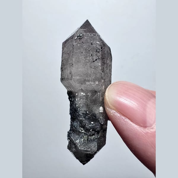 Double-terminated scepter amethyst with hematite from Inner Mongolia — detail view