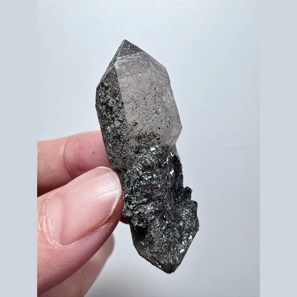 Double-terminated scepter amethyst with hematite from Inner Mongolia — detail view