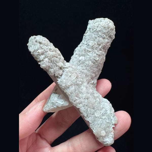 Crossed quartz floater with pale pink petal calcite from Inner Mongolia — complete view