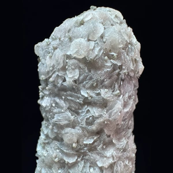 Crossed quartz floater with pale pink petal calcite from Inner Mongolia — detail view