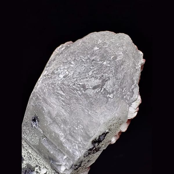 Green-skinned quartz floater with red petal calcite from Inner Mongolia — detail view