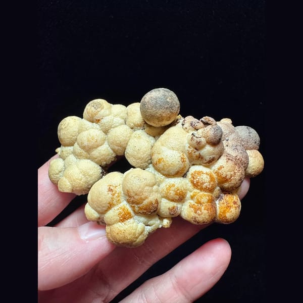 Calcite ball cluster floater from Shijiangshan — complete view