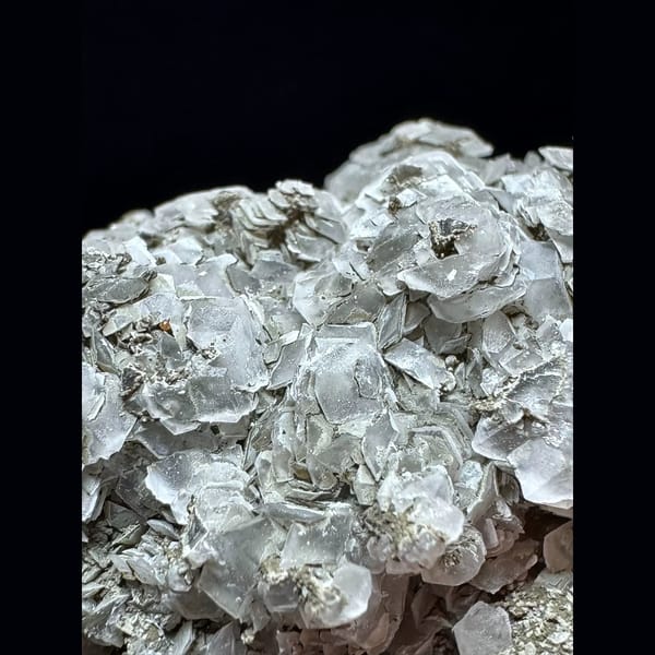 Green layered petal calcite on quartz floater from Inner Mongolia — detail view