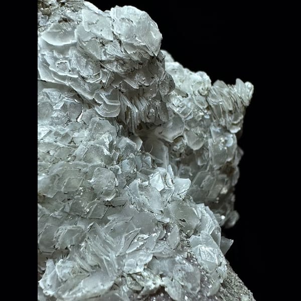 Green layered petal calcite on quartz floater from Inner Mongolia — detail view