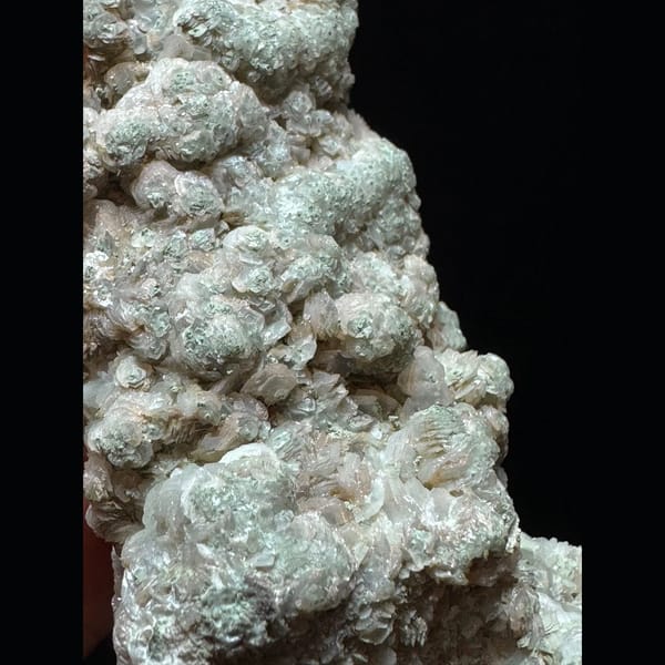 Green-coated quartz floater with petal calcite from Inner Mongolia — detail view