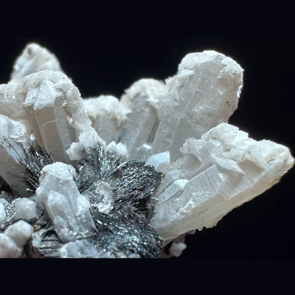 Quartz with petal calcite and specular hematite from Inner Mongolia — detail view