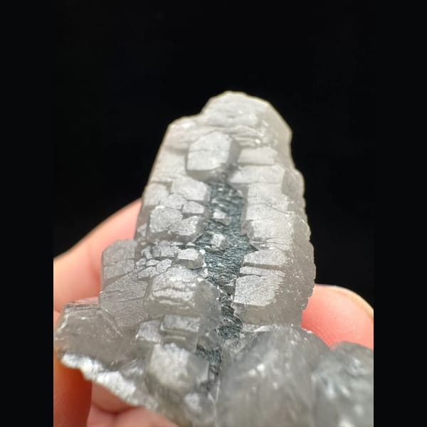 Grey Mercedes-star calcite from Inner Mongolia — detail view