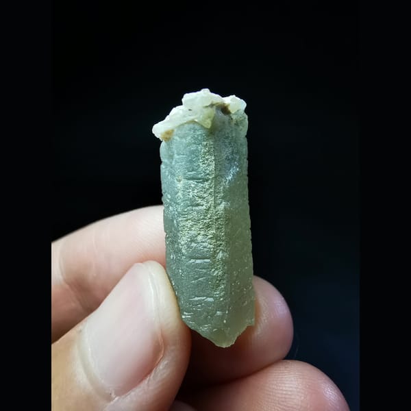 Green quartz crystal with a calcite-cut top — alternate view