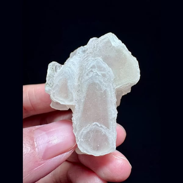 Pink layered manganoan calcite from Inner Mongolia — complete view