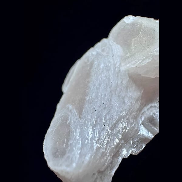 Pink layered manganoan calcite from Inner Mongolia — alternate view