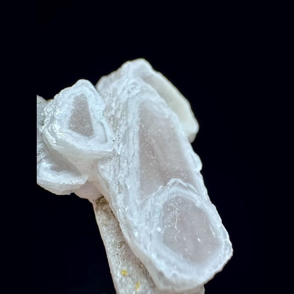 Pink layered manganoan calcite from Inner Mongolia — detail view