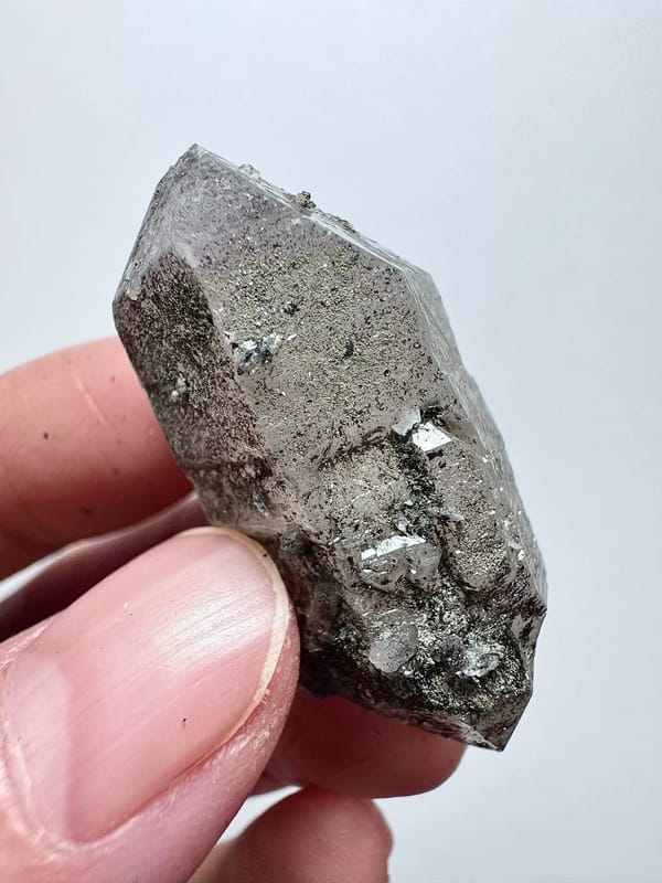 Double-Terminated Amethyst with Specular Hematite — Inner Mongolia — individual mineral specimen view 1