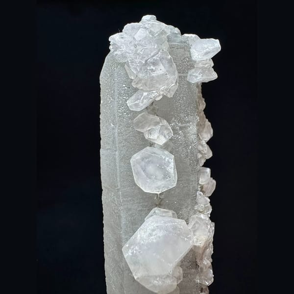 Tall sparkly quartz floater with petal calcite from Inner Mongolia — alternate view