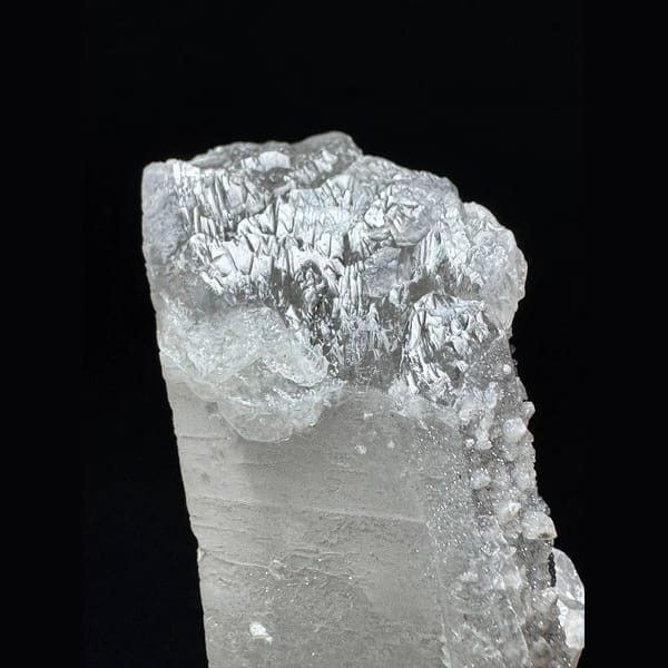 Tall sparkly quartz floater with petal calcite from Inner Mongolia — detail view
