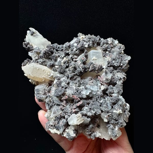 Large sparkly quartz floater with petal calcite and hematite from Inner Mongolia — alternate view