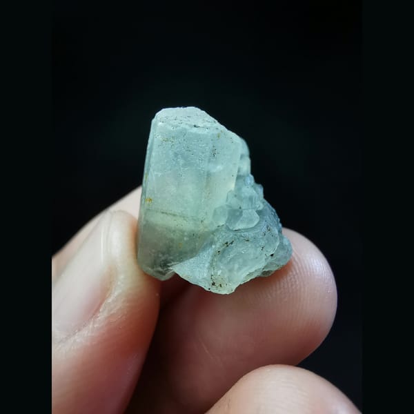 Calcite crystal with a three-faced termination — complete view