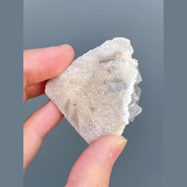 Lilac-purple fluorite cubes on white matrix from Yaogangxian — detail view