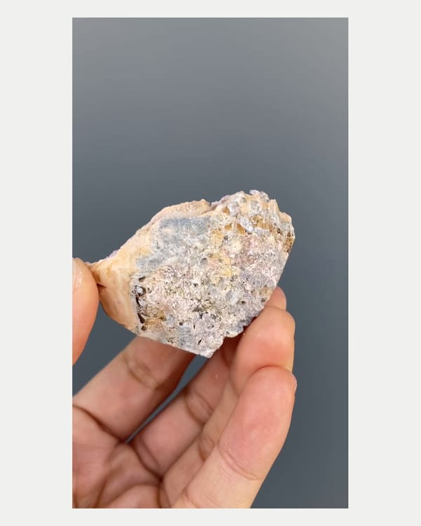 Complete reverse view of pink rhodochrosite specimen