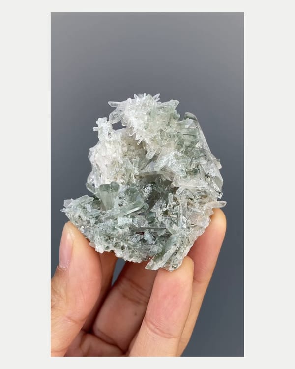 Complete front view of green phantom quartz cluster