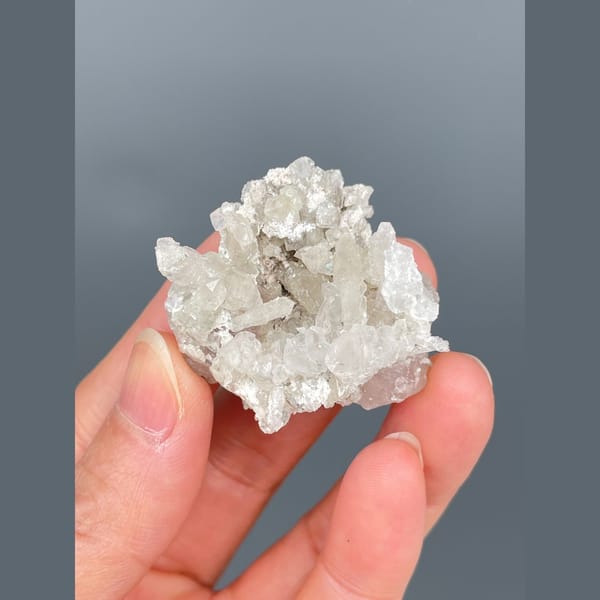 Glassy colourless fluorite with quartz from Inner Mongolia — detail view