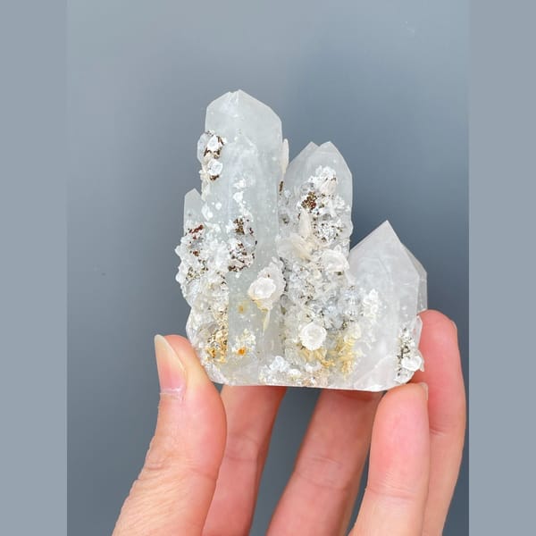 Clear quartz crystals with calcite from Hunan — complete view