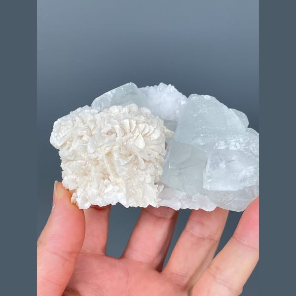 Pale blue fluorite with white dolomite from Hunan — detail view