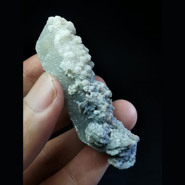 Floater quartz with specular hematite and white calcite — complete view
