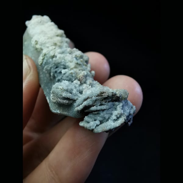Floater quartz with specular hematite and white calcite — alternate view
