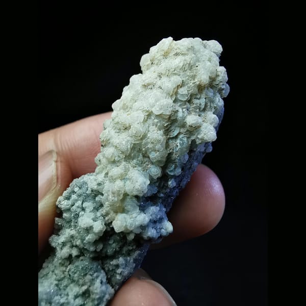 Floater quartz with specular hematite and white calcite — alternate view