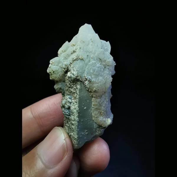 Quartz crystal capped with a thick calcite coating — alternate view