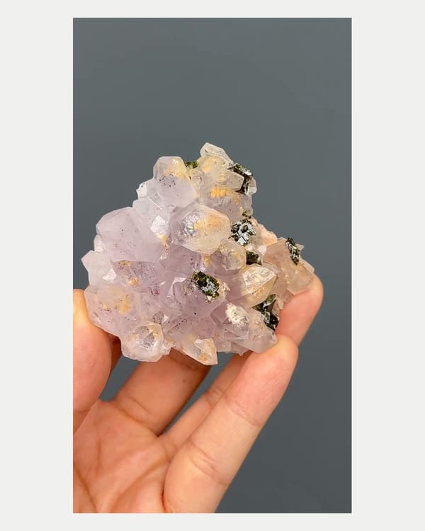 Complete front view of garden quartz with epidote