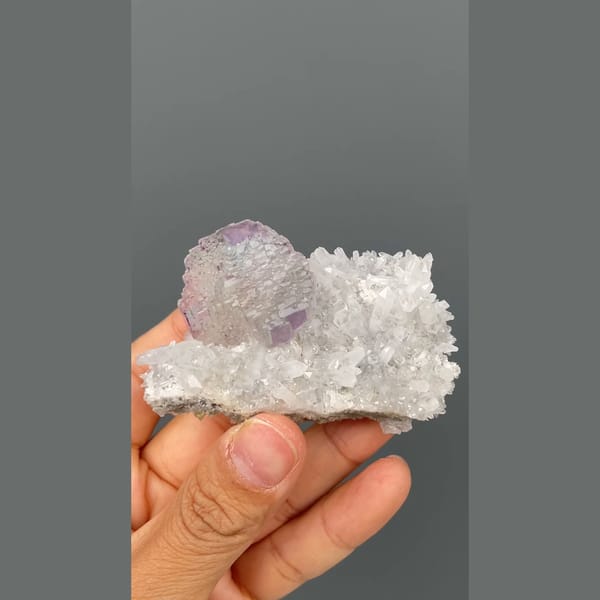 Stepped lavender fluorite on white quartz from Shangbao, Hunan — detail view