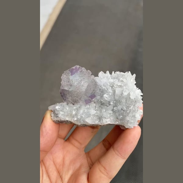 Stepped lavender fluorite on white quartz from Shangbao, Hunan — detail view