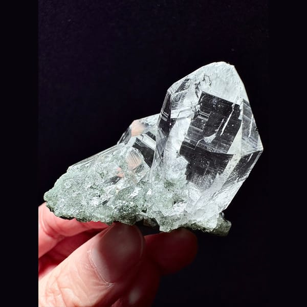Clear Himalayan quartz cluster with green phantom base from India — alternate view