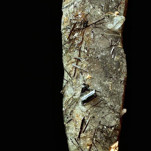 Double-terminated quartz with black tourmaline from Hashupi, Pakistan — detail view