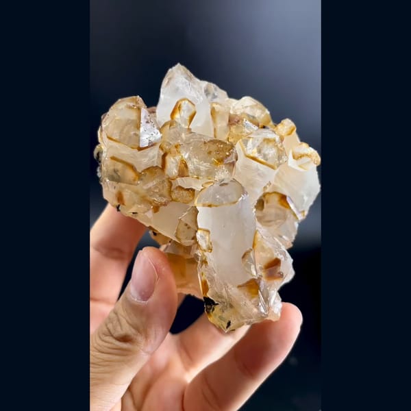 Chunky caramel-coated quartz crystal cluster from Jinlong, Guangdong — complete view