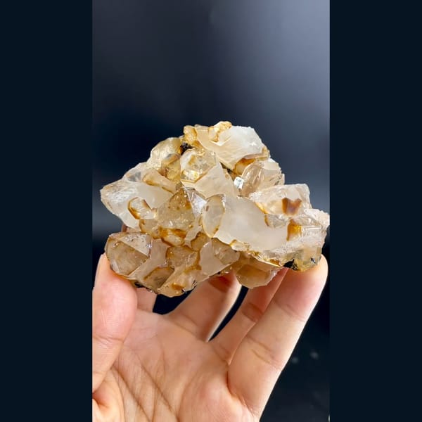 Chunky caramel-coated quartz crystal cluster from Jinlong, Guangdong — detail view