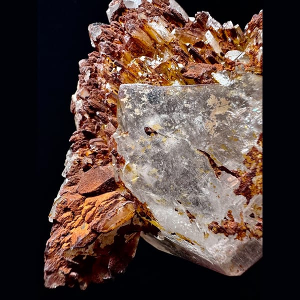 Double-terminated quartz floater with golden crust from Hashupi, Pakistan — detail view