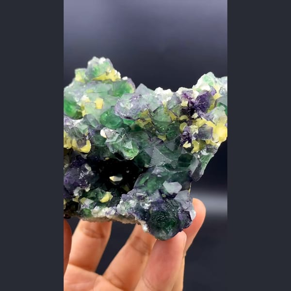 Green cubic fluorite with yellow mica and black tourmaline from South Africa — complete view
