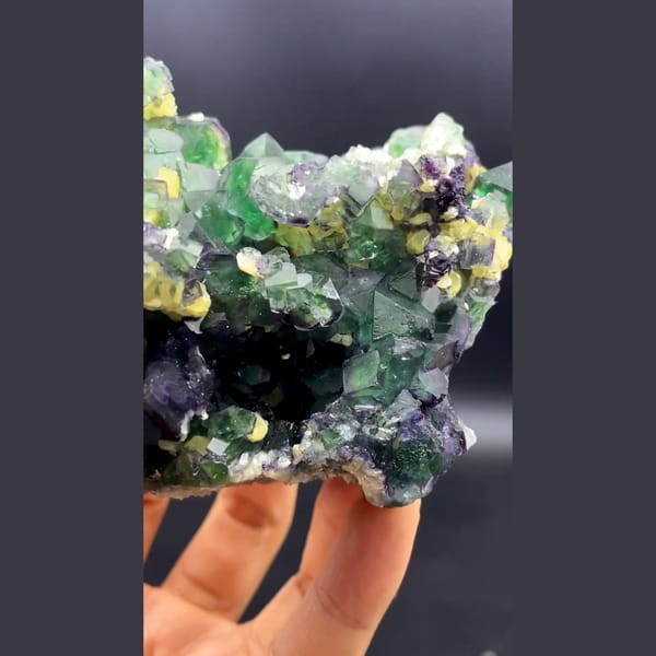 Green cubic fluorite with yellow mica and black tourmaline from South Africa — alternate view