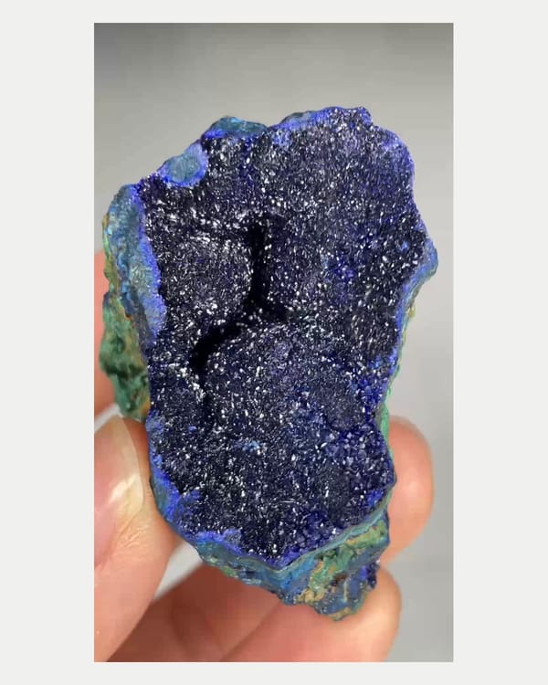 Complete front view of azurite geode with malachite