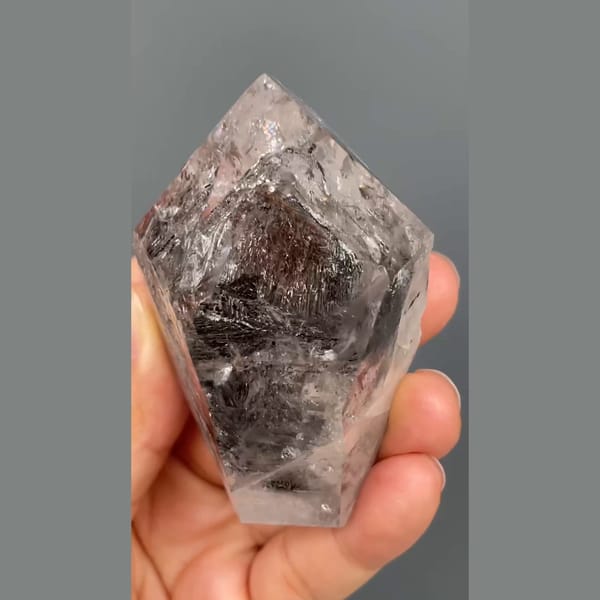 Large skeletal quartz with dark smoky inclusions from Jinkouhe — complete view