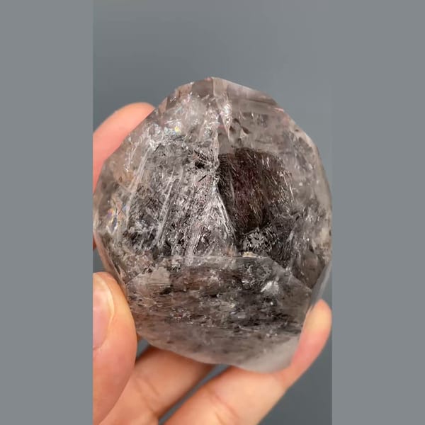 Large skeletal quartz with dark smoky inclusions from Jinkouhe — alternate view