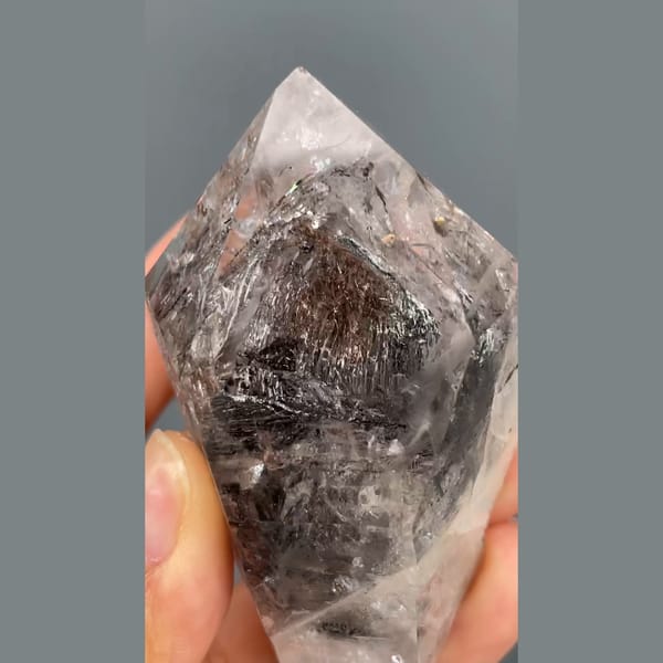 Large skeletal quartz with dark smoky inclusions from Jinkouhe — detail view