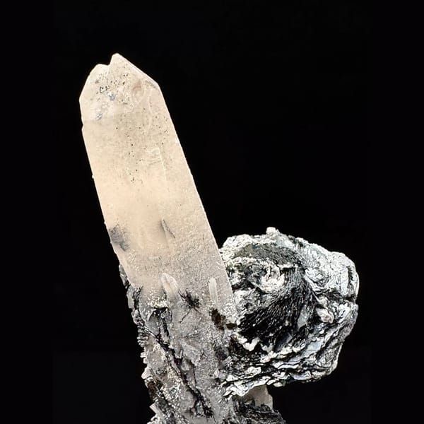 Quartz floater with specular hematite rosettes from Inner Mongolia — detail view