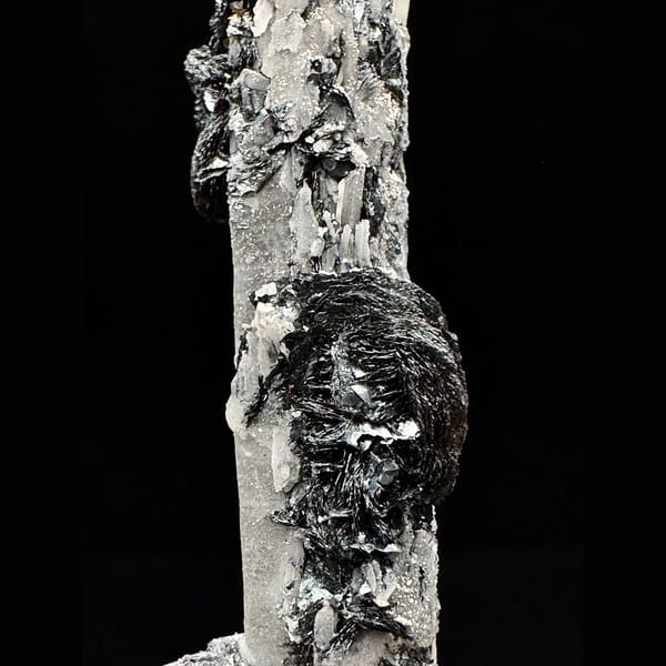 Quartz floater with specular hematite rosettes from Inner Mongolia — detail view